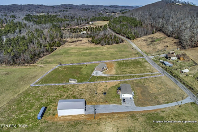 aerial view featuring a mountain view and a rural view