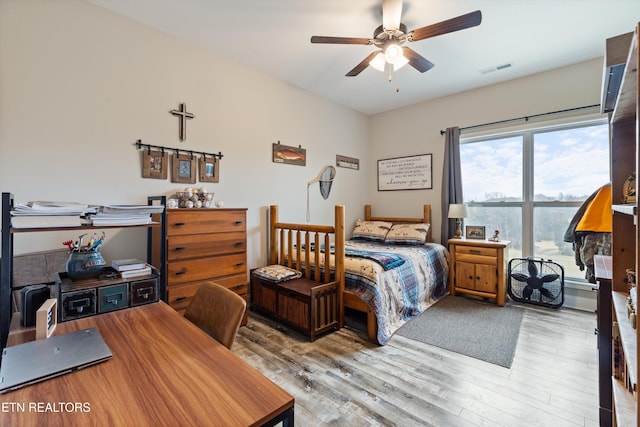 bedroom featuring ceiling fan and light hardwood / wood-style flooring