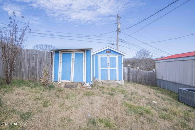 view of outbuilding featuring central AC