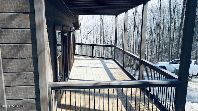 view of snow covered deck