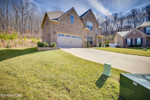 view of front of property featuring a garage and a front yard