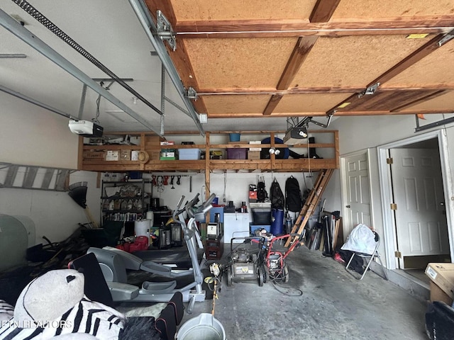 garage featuring a garage door opener