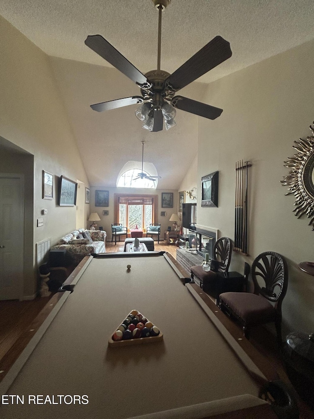 recreation room featuring high vaulted ceiling, billiards, a textured ceiling, and ceiling fan