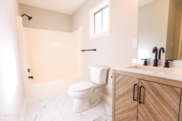 full bathroom featuring vanity, tub / shower combination, and toilet