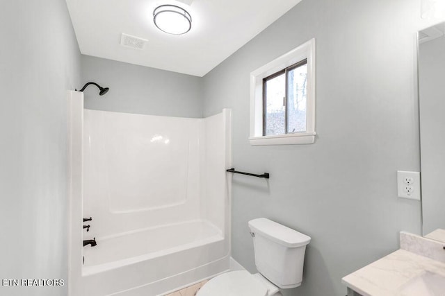 full bathroom with vanity, shower / washtub combination, and toilet