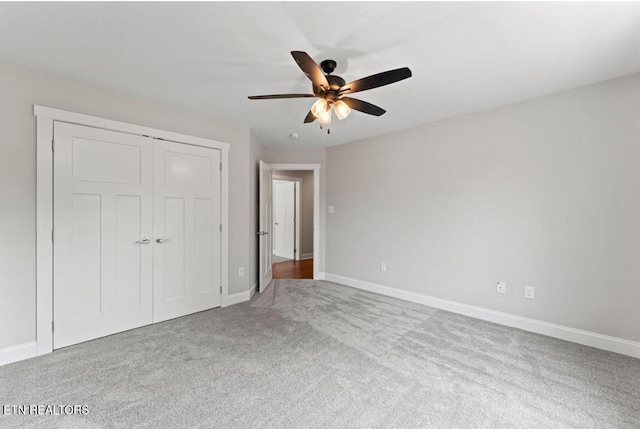 295 Caulderwood Ln, Lenoir City, TN 37771 - unfurnished bedroom with baseboards, a closet, carpet flooring, and a ceiling fan