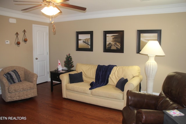 living room with crown molding, dark hardwood / wood-style floors, and ceiling fan