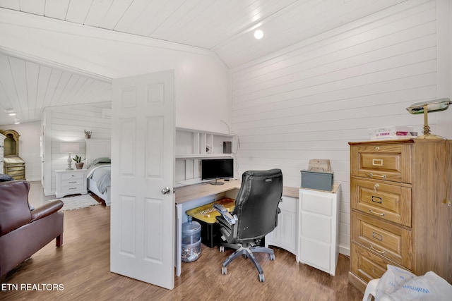 home office featuring wood ceiling, vaulted ceiling, and hardwood / wood-style floors