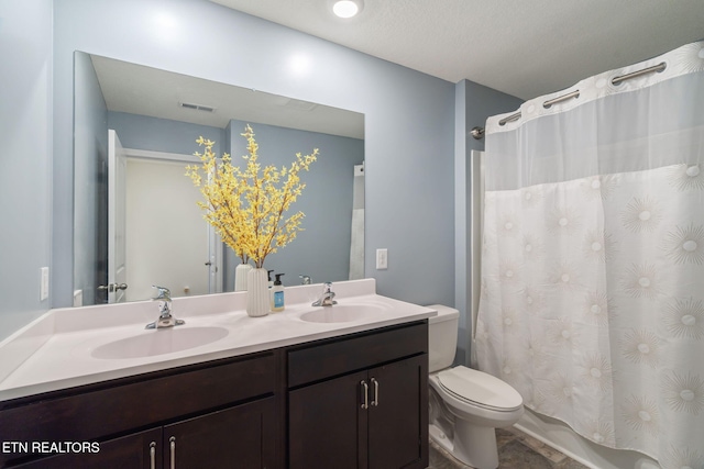 full bathroom with shower / bathtub combination with curtain, vanity, and toilet