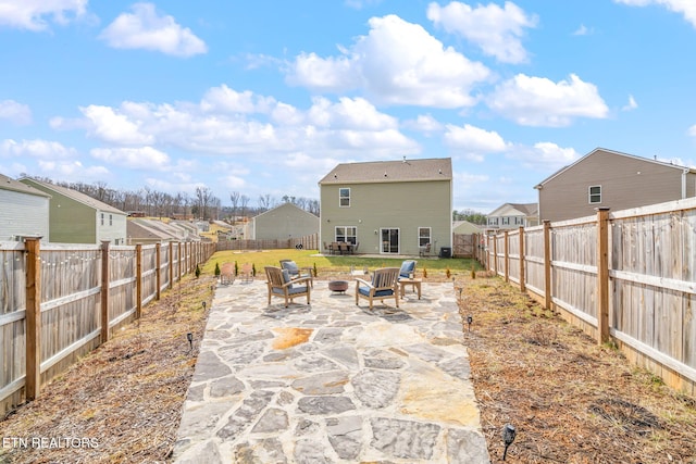 view of patio / terrace with an outdoor fire pit