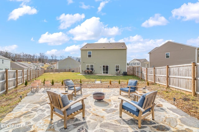 view of patio / terrace featuring an outdoor fire pit