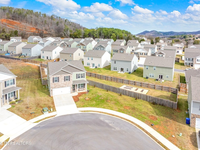 drone / aerial view featuring a mountain view