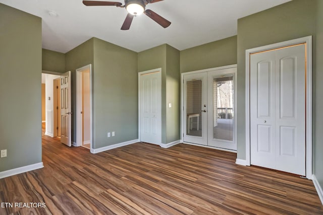 unfurnished bedroom with access to exterior, french doors, dark wood-style flooring, and baseboards