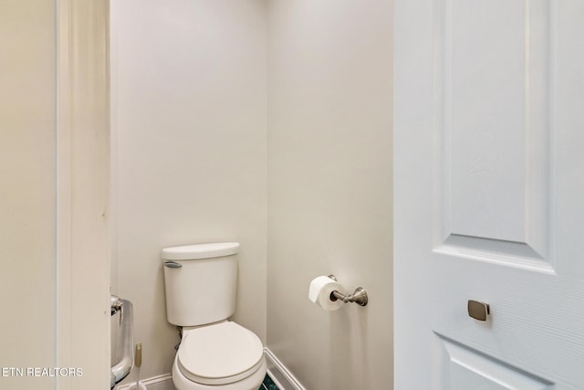 bathroom featuring toilet