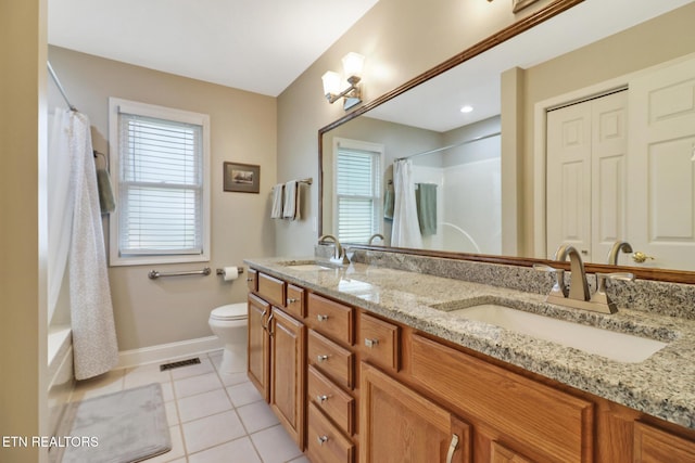 full bathroom featuring vanity, shower / bath combo, tile patterned floors, and toilet