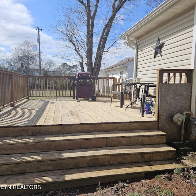 wooden deck with area for grilling