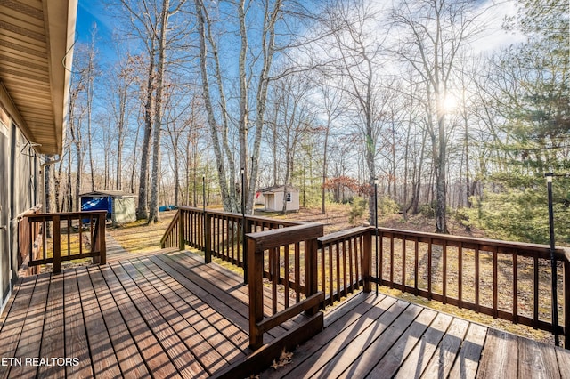 deck featuring a storage shed