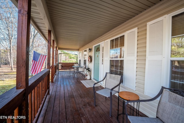 deck featuring covered porch