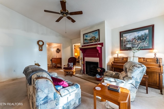 living room featuring ceiling fan, vaulted ceiling, and light carpet