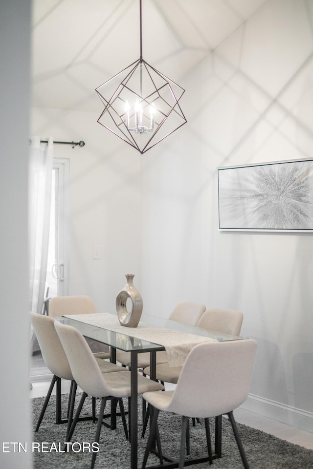 dining area with a chandelier