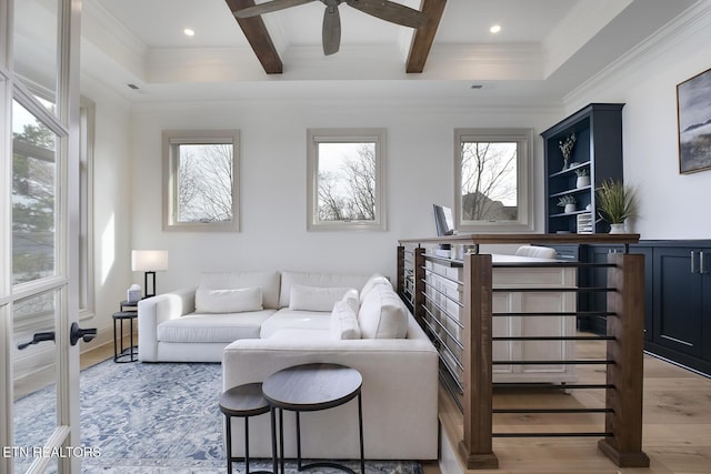 living room with recessed lighting, coffered ceiling, wood finished floors, ornamental molding, and beam ceiling