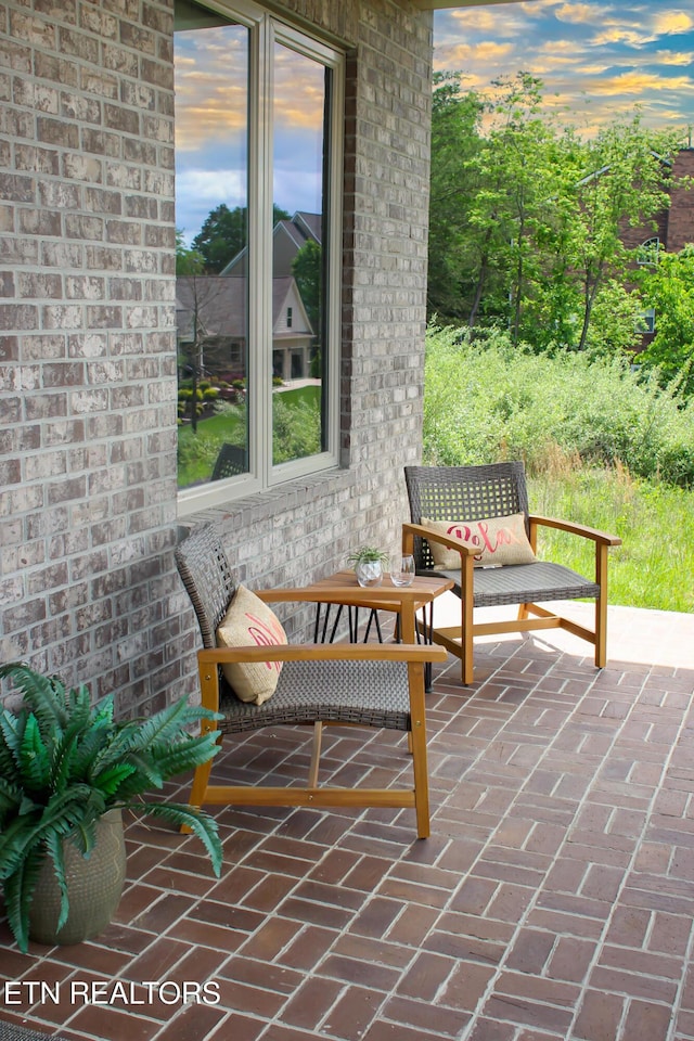 116 Unole Trl, Vonore, TN 37885 - view of patio terrace at dusk