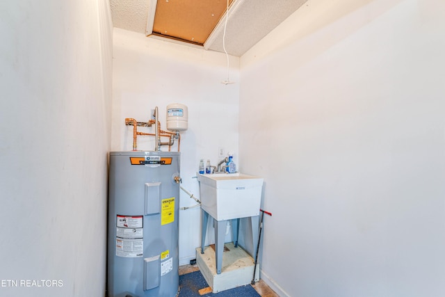 utility room with water heater