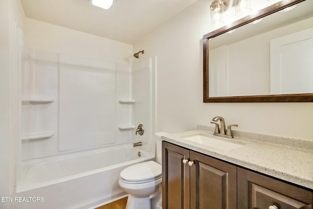 full bathroom featuring shower / bathtub combination, vanity, and toilet