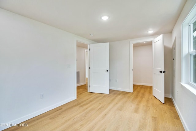 unfurnished bedroom featuring light hardwood / wood-style flooring