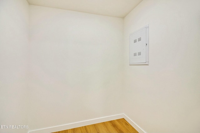 laundry room featuring hardwood / wood-style floors