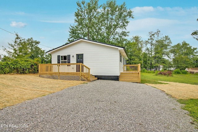 view of front of property featuring a deck