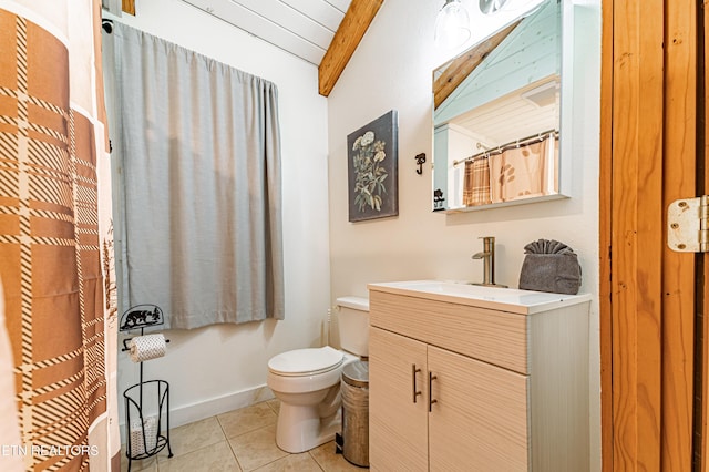 bathroom featuring tile patterned floors, toilet, lofted ceiling with beams, and vanity