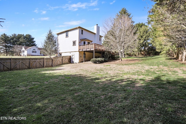 view of yard featuring a wooden deck