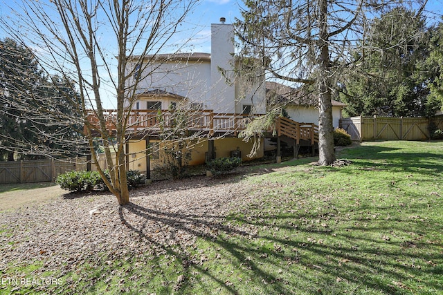 view of yard with a deck