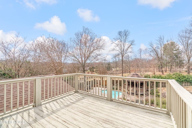 deck with an outdoor pool