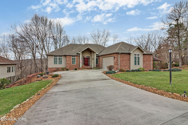 view of front of property featuring a garage and a front yard