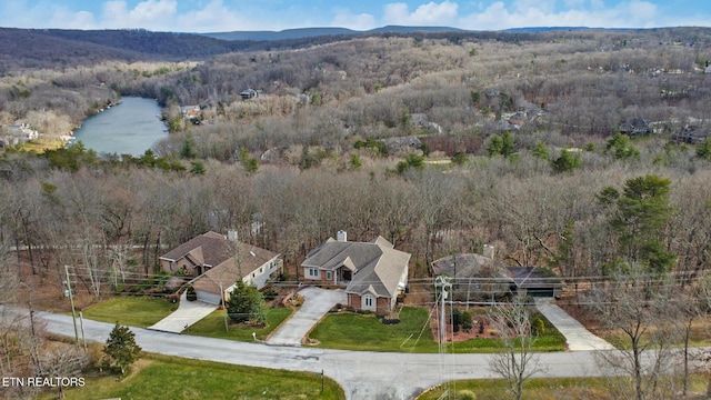 bird's eye view with a water and mountain view