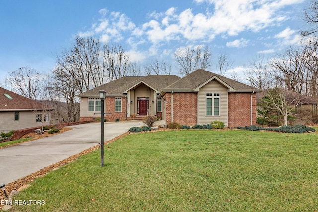 single story home with a front lawn