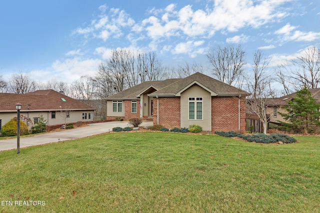 ranch-style home with a front yard