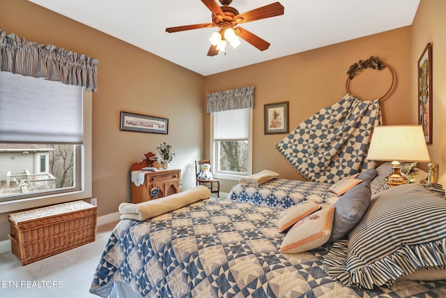 bedroom featuring ceiling fan and carpet flooring