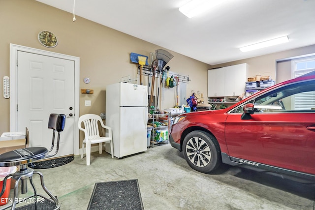 garage with white refrigerator