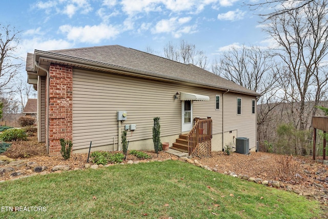 back of house with a yard