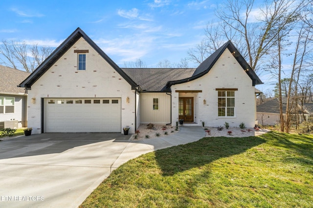 view of front of property with driveway, central AC, and a front yard