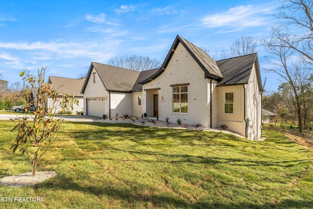 view of front of property with a garage, brick siding, concrete driveway, and a front yard