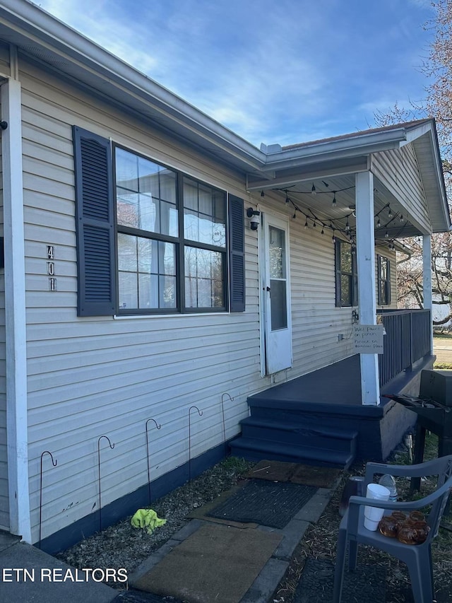 exterior space featuring covered porch