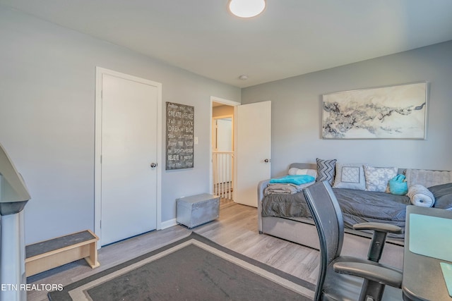 bedroom featuring wood-type flooring