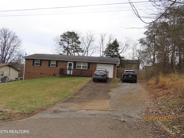 view of front facade featuring a garage and a front lawn