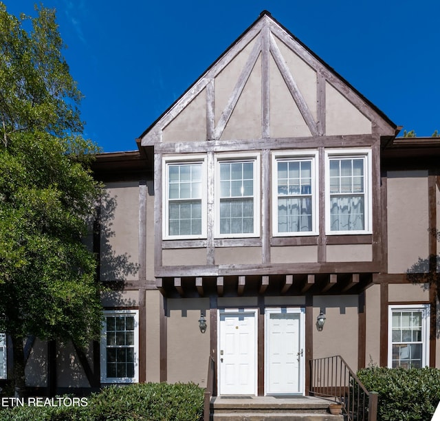 view of property featuring stucco siding