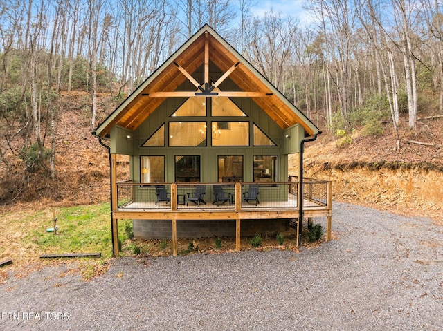 chalet / cabin featuring a wooden deck