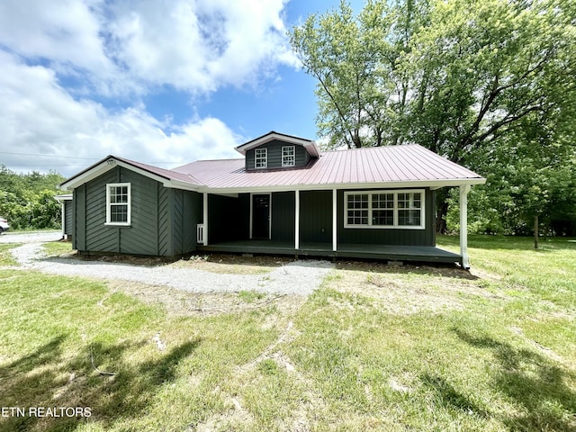 3609 Plateau Rd, Crossville, TN 38571 - back of property featuring a yard and a porch
